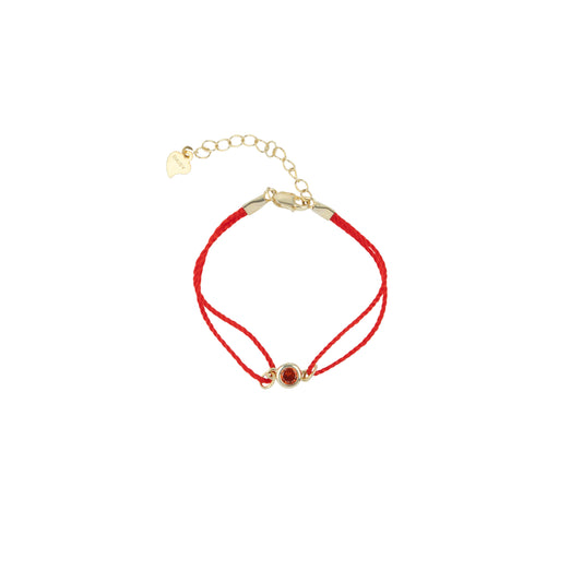Red string with red rhinestone